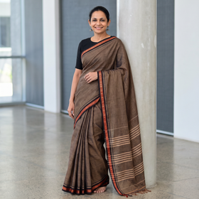 Brown Dharwad Cotton Saree with Border, draped and worn by a woman, AI visual of the saree, iTokri