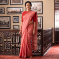 Pink Dharwad Woven Mercerised Cotton Saree with Border, draped and worn by a woman, AI visual of the saree, iTokri