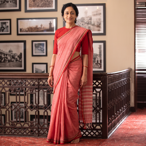 Pink Dharwad Woven Mercerised Cotton Saree with Border, draped and worn by a woman, AI visual of the saree, iTokri