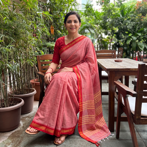Pink Dharwad Woven Mercerised Cotton Saree with Border, draped and worn by a woman, AI visual of the saree, iTokri