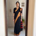 Black Dharwad Woven Mercerised Cotton Saree with Border, draped and worn by a woman, AI visual of the saree, iTokri