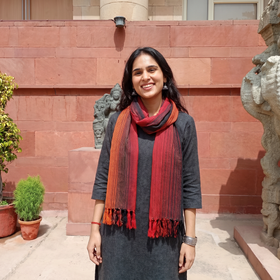 Multicolor Double Shade Kumaun Handwoven Pure Merino Wool Stole, worn by a woman, AI visual of the stole, iTokri