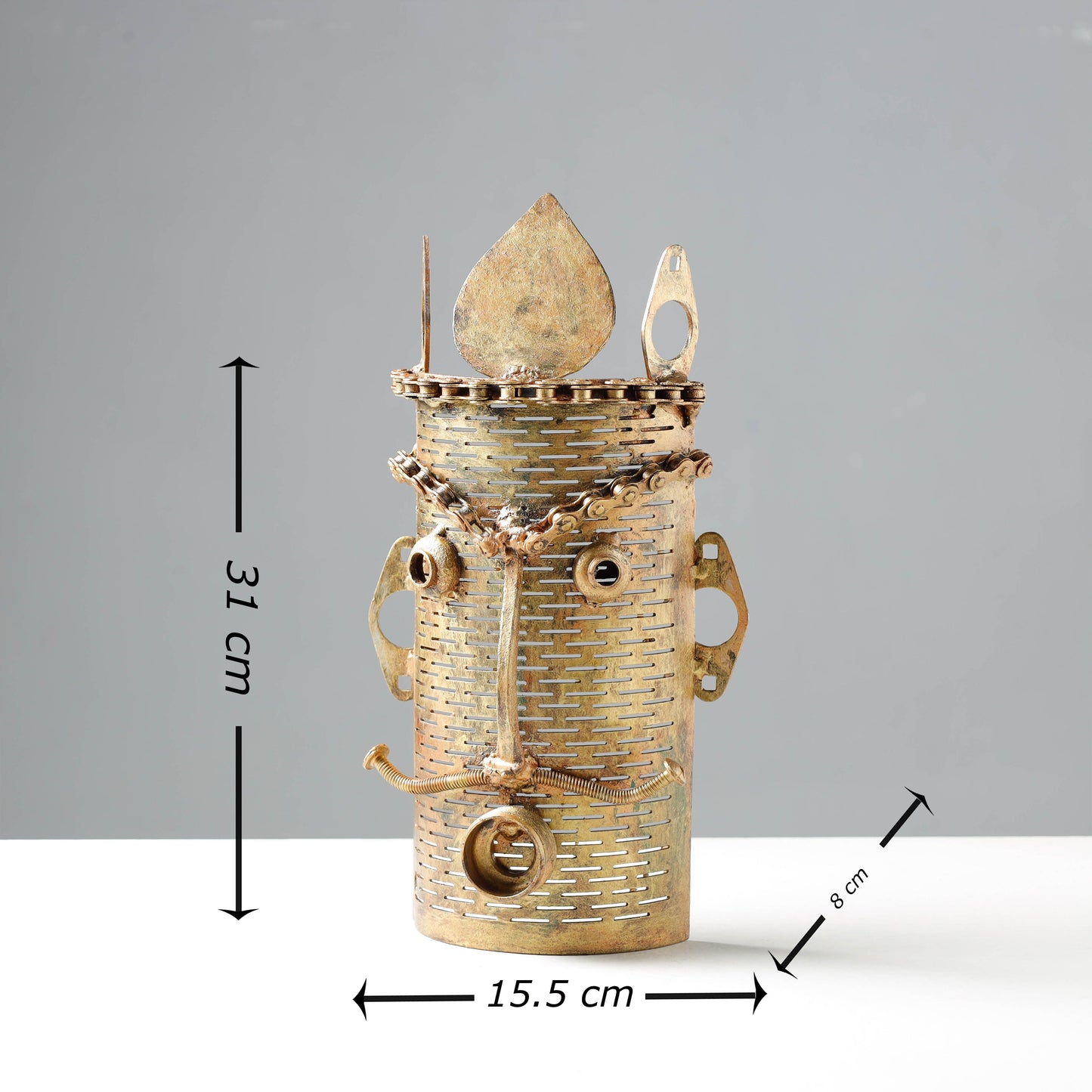 metal face sculpture