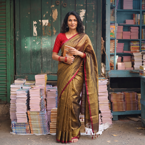 Brown Fine Tissue Zari Bengal Saree with Embroidered Blouse, draped and worn by a woman, AI visual of the saree, iTokri