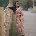 Pink floral hand block print mulberry silk Sanganeri saree, draped and worn by a woman, by artisan Prem Dosaya, AI visual of the saree, iTokri
