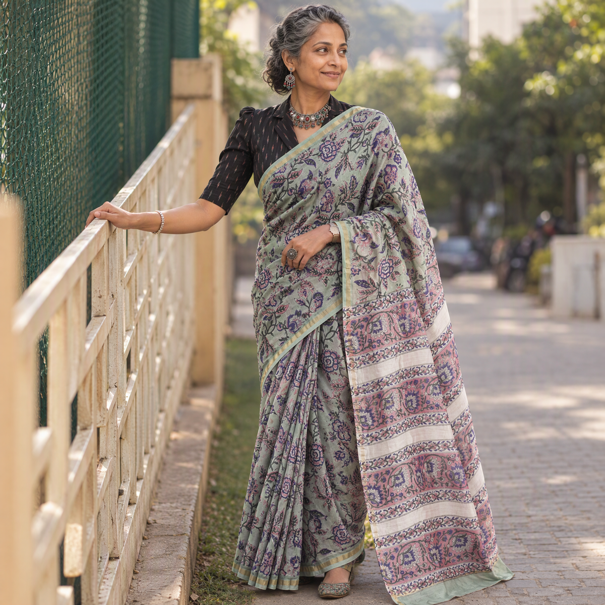 Green floral hand block print mulberry silk Sanganeri saree, draped and worn by a woman, by artisan Prem Dosaya, AI visual of the saree, iTokri