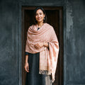 Peach Floral Sanganeri Print Pure Merino Wool Handwoven Shawl, worn by a model, AI visual of the shawl, iTokri