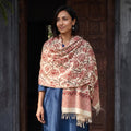Off White Floral Sanganeri Print Pure Merino Wool Handwoven Shawl, worn by a model, AI visual of the shawl, iTokri