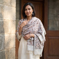 Off White Floral Sanganeri Print Pure Merino Wool Handwoven Shawl, worn by a model, AI visual of the shawl, iTokri