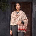 Peach Floral Sanganeri Print Pure Merino Wool Handwoven Shawl, worn by a model, AI visual of the shawl, iTokri