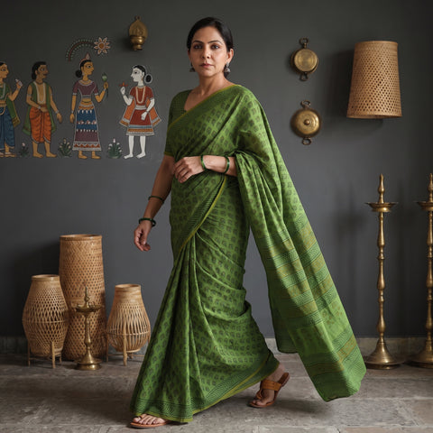 Green Gamthi Hand Block Print Pure Mul Cotton Saree with Blouse Piece, draped and worn by a woman, AI visual of the saree, iTokri