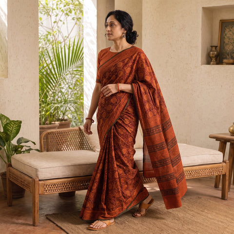 Red Gamthi Hand Block Print Pure Mul Cotton Saree with Blouse Piece, draped and worn by a woman, AI visual of the saree, iTokri