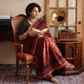 Red Ghicha Pallu Chanderi Silk Natural Dyed Ajrakh Print Saree, draped and worn by a woman, AI visual of the saree, iTokri