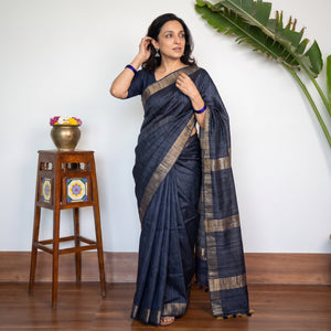 Blue Ghicha Tussar Silk Bhagalpuri Pure Handwoven Saree with Zari Border, draped and worn by a woman, AI visual of the saree, iTokri