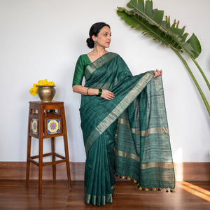 Green Ghicha Tussar Silk Bhagalpuri Pure Handwoven Saree with Zari Border, draped and worn by a woman, AI visual of the saree, iTokri