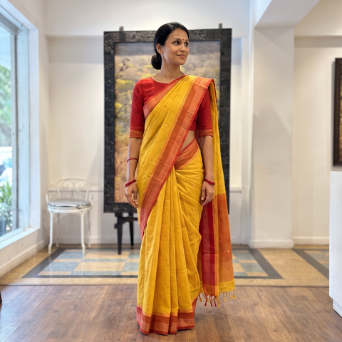 Yellow Godavari Jamdani Buti Pure Handloom Cotton Saree, draped and worn by a woman, AI visual of the saree, iTokri