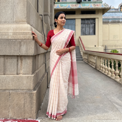 Off White Godavari Jamdani Buti Pure Handloom Cotton Saree, draped and worn by a woman, AI visual of the saree, iTokri