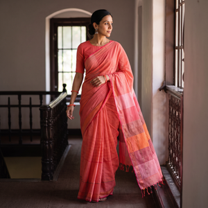 Orange Godavari Plain Pure Handloom Dobby Cotton Saree, draped and worn by a woman, AI visual of the saree, iTokri