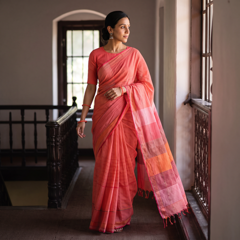 Orange Godavari Plain Pure Handloom Dobby Cotton Saree, draped and worn by a woman, AI visual of the saree, iTokri