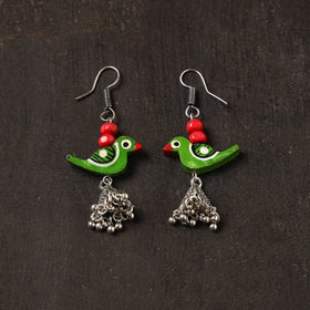 Avira german silver jhumki earrings with wooden bird