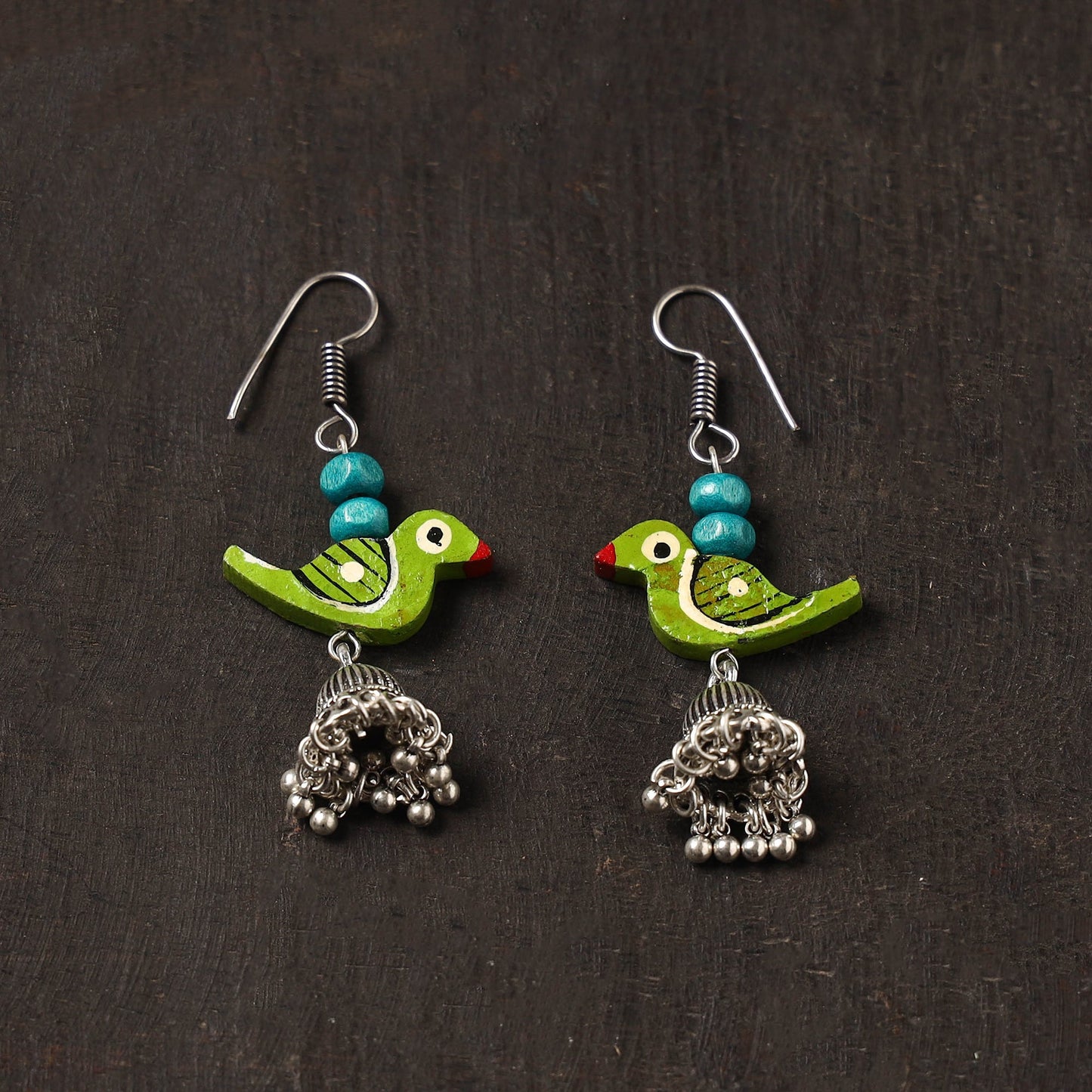 Green - avni german silver jhumki earrings with wooden bird