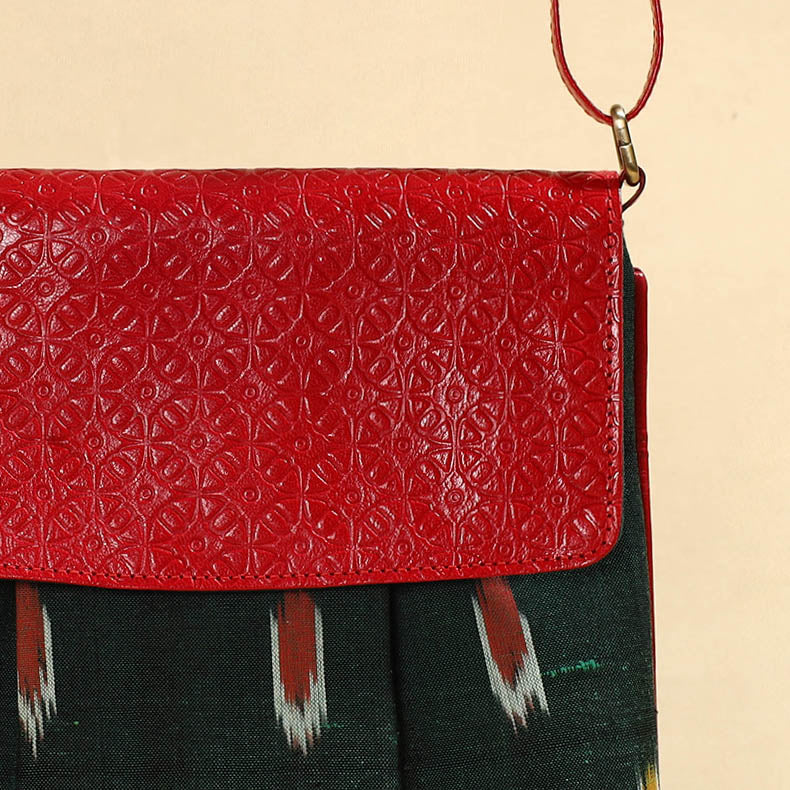 Green Handcrafted Ikat Fabric Sling Bag with Embossed Leather Flap