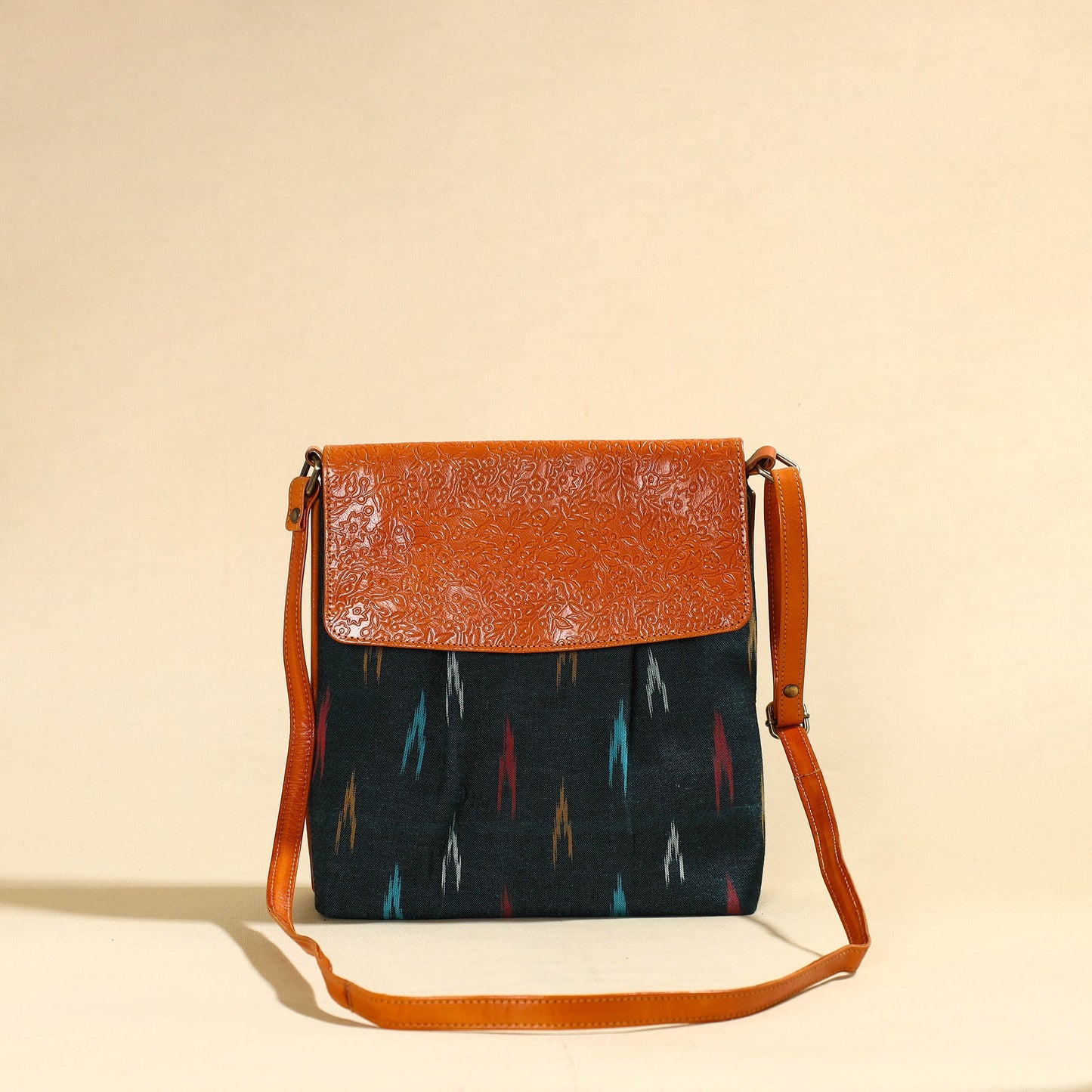  Handcrafted Ikat Fabric Sling Bag with Embossed Leather Flap 