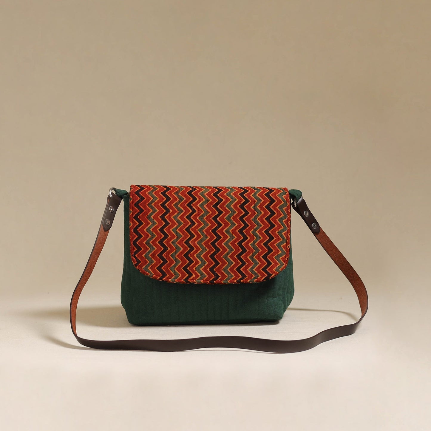 Handcrafted quilted ajrakh block printed fabric sling bag