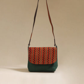 Handcrafted quilted ajrakh block printed fabric sling bag