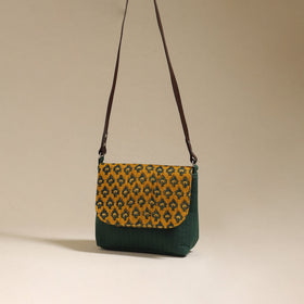 Handcrafted quilted ajrakh block printed fabric sling bag