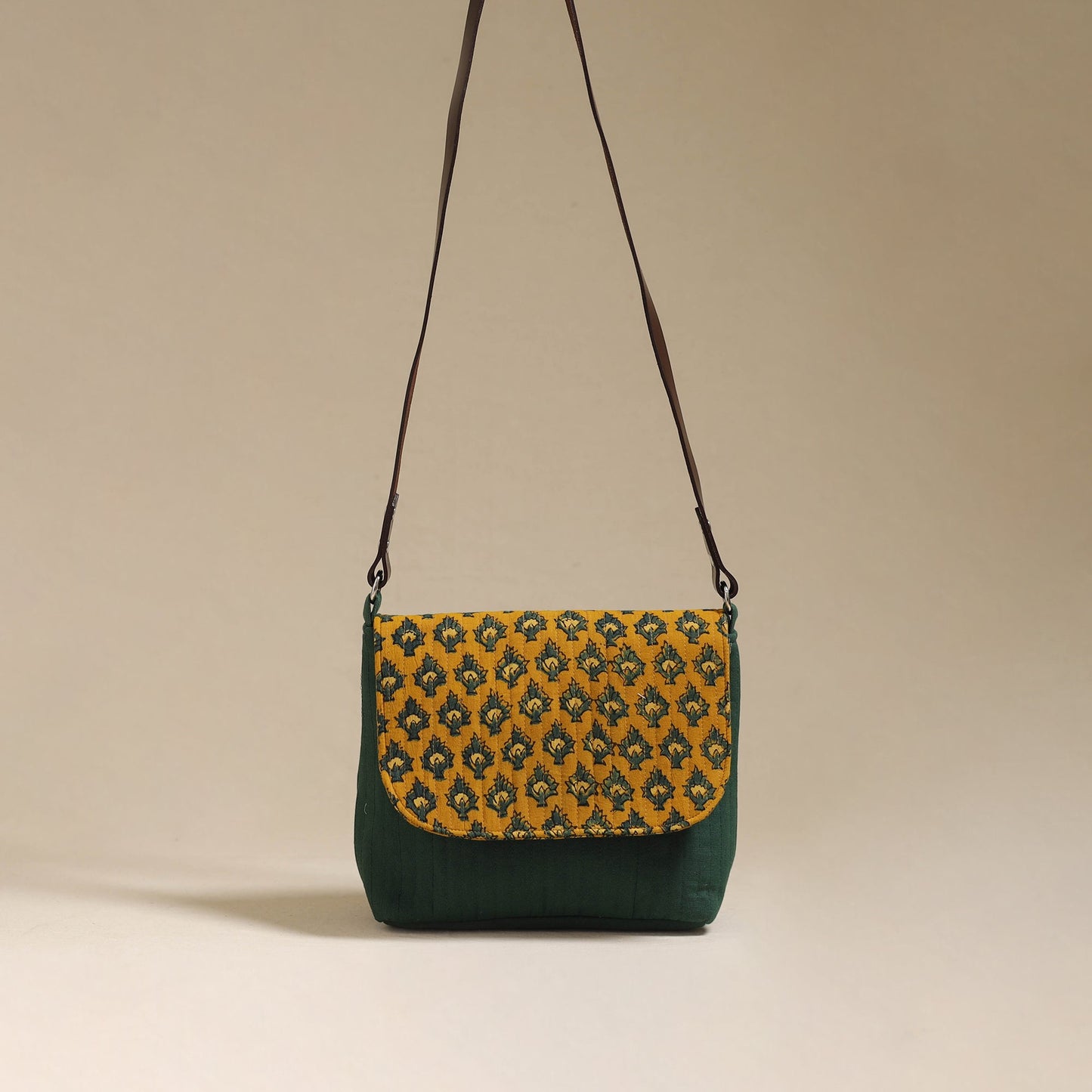 Handcrafted quilted ajrakh block printed fabric sling bag
