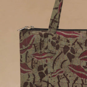 Handcrafted quilted handbag 13