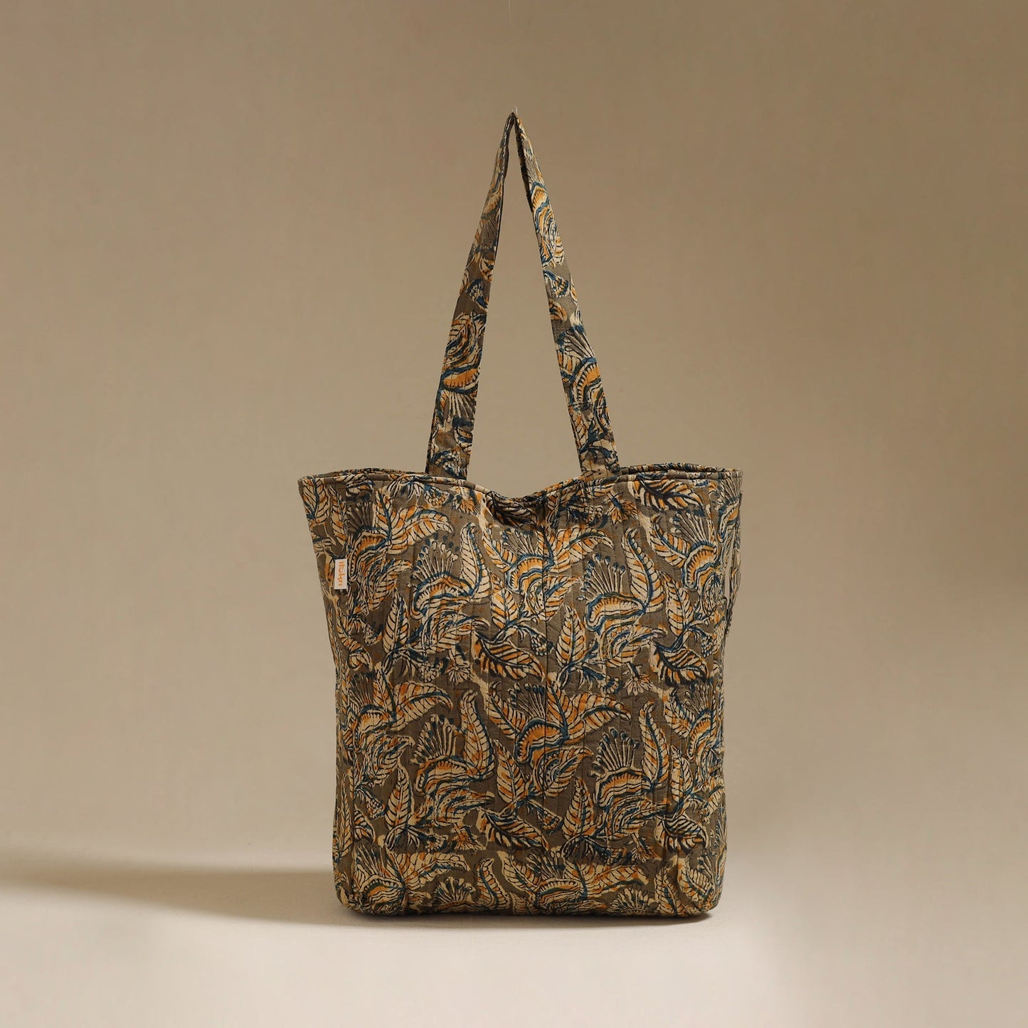 Handcrafted quilted kalamkari block printed fabric tote bag