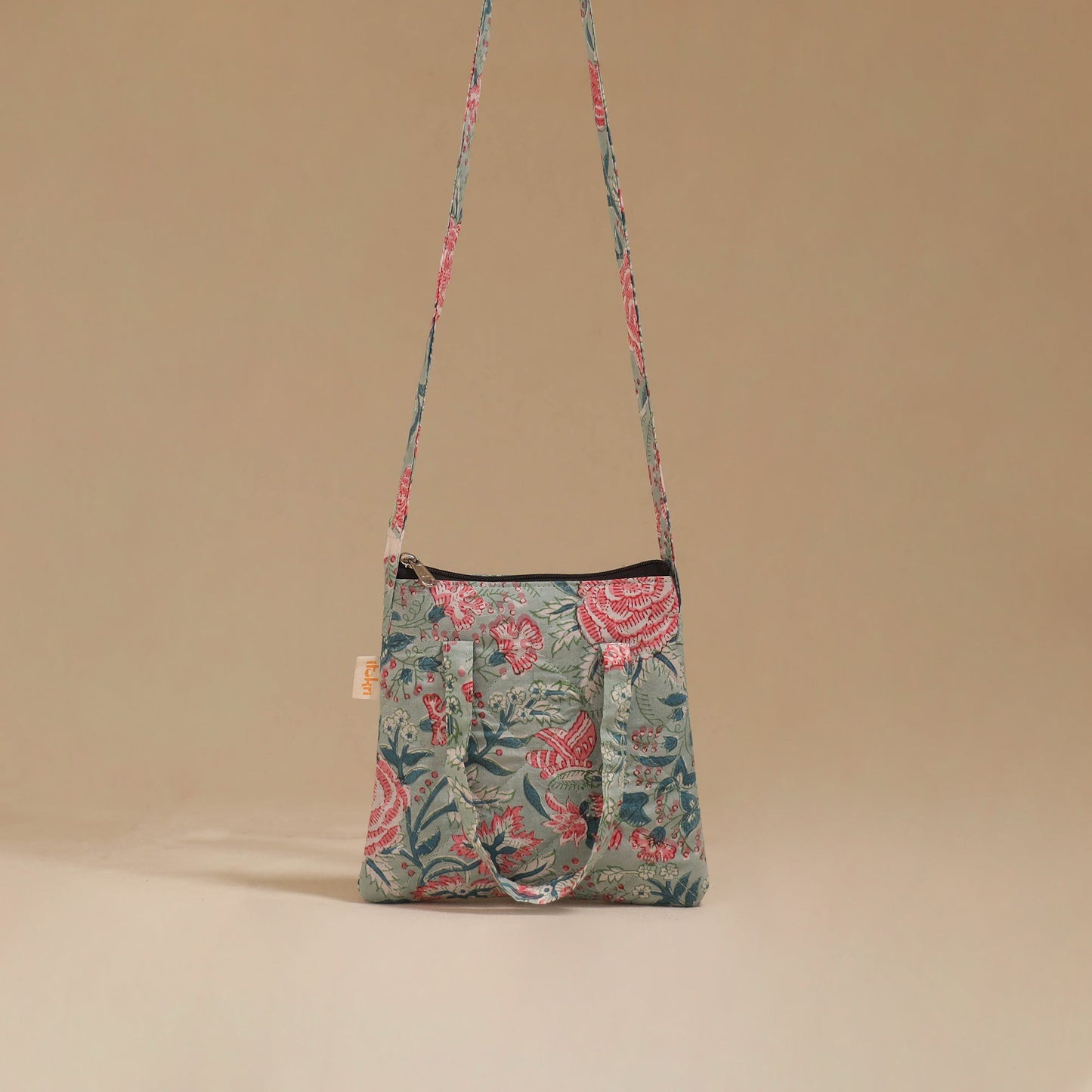 Handcrafted quilted sling bag 13