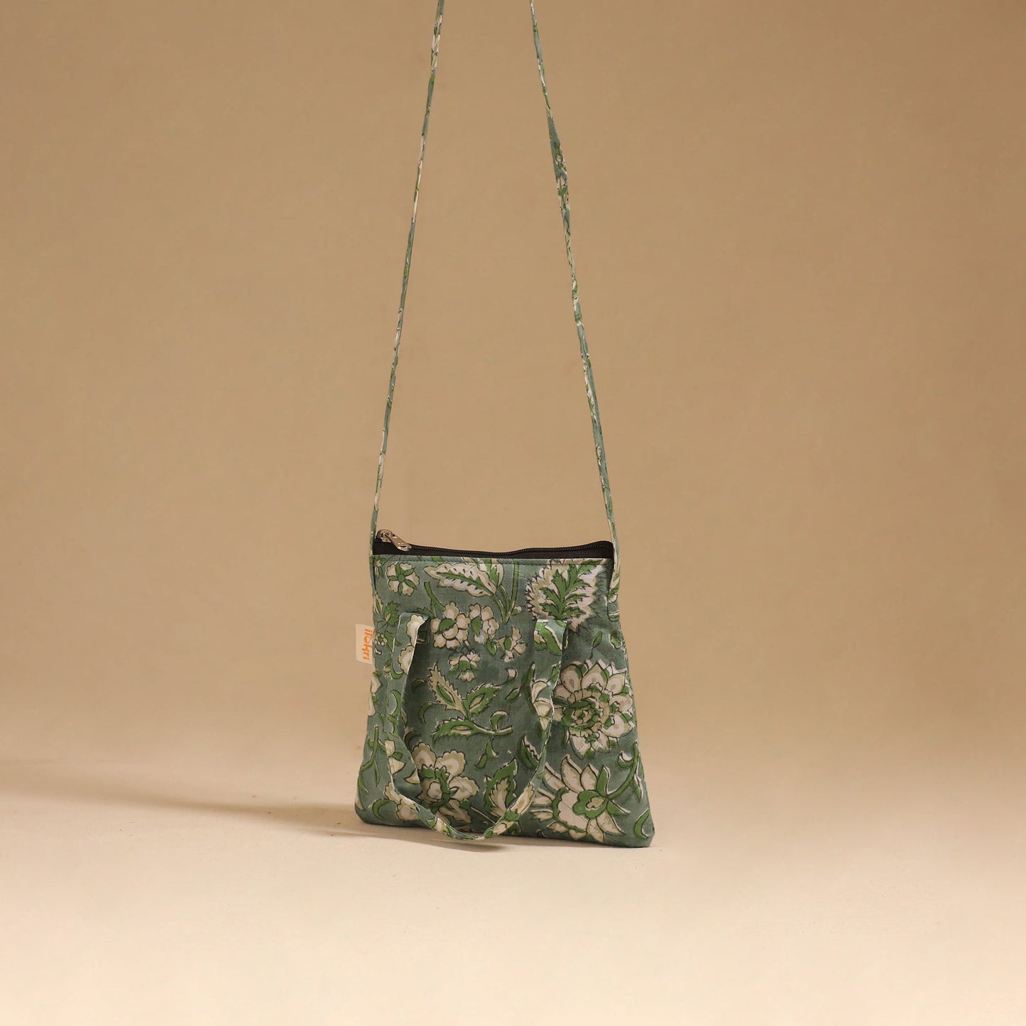 Handcrafted quilted sling bag 13