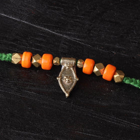Handcrafted tribal dokra brass thread rakhi 24