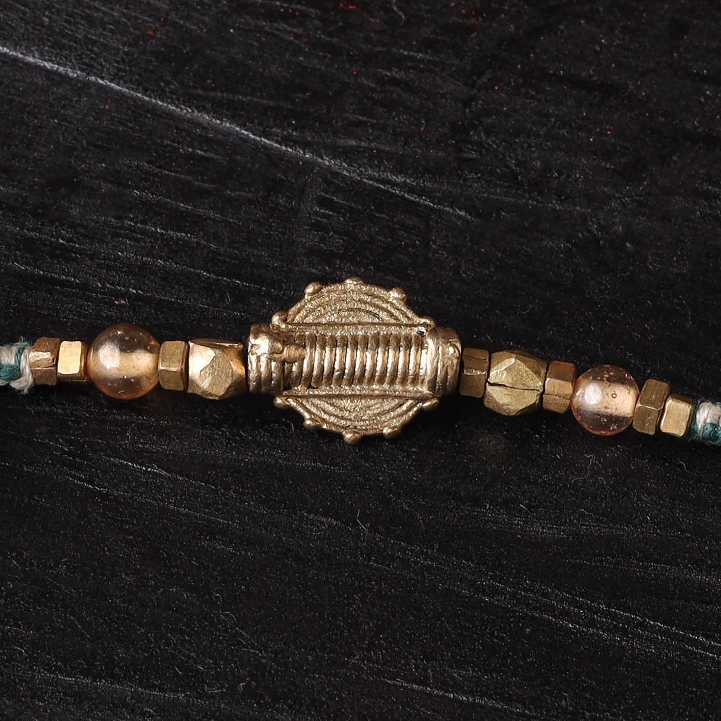 Handcrafted tribal dokra brass thread rakhi 30