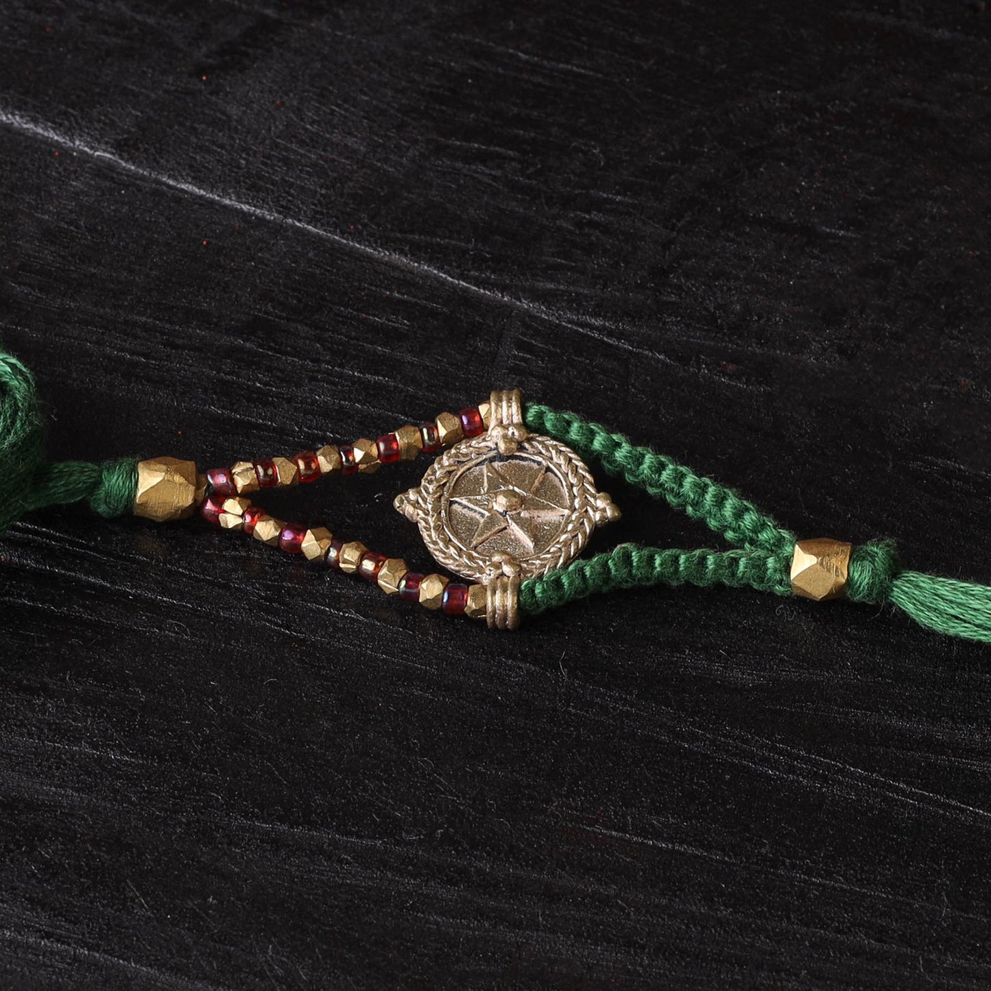 Handcrafted tribal dokra brass thread rakhi 35