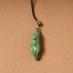 Green - quirklets handpainted clay pea pod bag charm