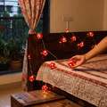 Greenkraft Full Moon Handcrafted Bamboo String Light (3M), lit in a home in the evening, AI visual of the light, iTokri