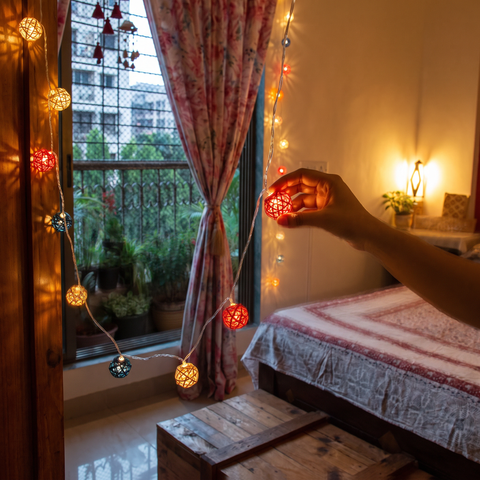 Greenkraft Full Moon Handcrafted Bamboo String Light (3M), lit in a home in the evening, AI visual of the light, iTokri