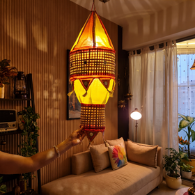 Greenkraft Ghoomar Handcrafted Bamboo Lantern for Home Decor, lit in a home in the evening, AI visual of the light, iTokri