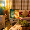 Greenkraft Handcrafted Bamboo Lantern for Home Decor, lit in a home in the evening, AI visual of the light, iTokri