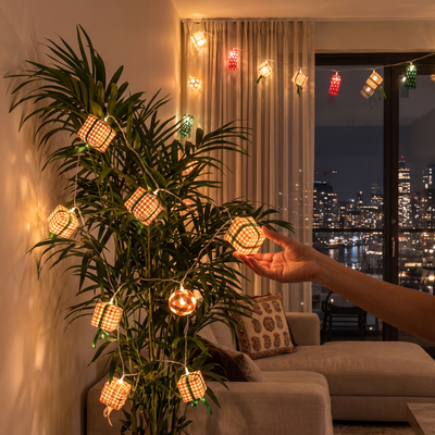 Greenkraft Handcrafted Bamboo String Light (3M), lit in a home in the evening, AI visual of the light, iTokri