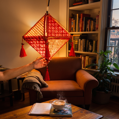 Greenkraft Jhoomar Handcrafted Bamboo Lantern for Home Decor, lit in a home in the evening, AI visual of the light, iTokri