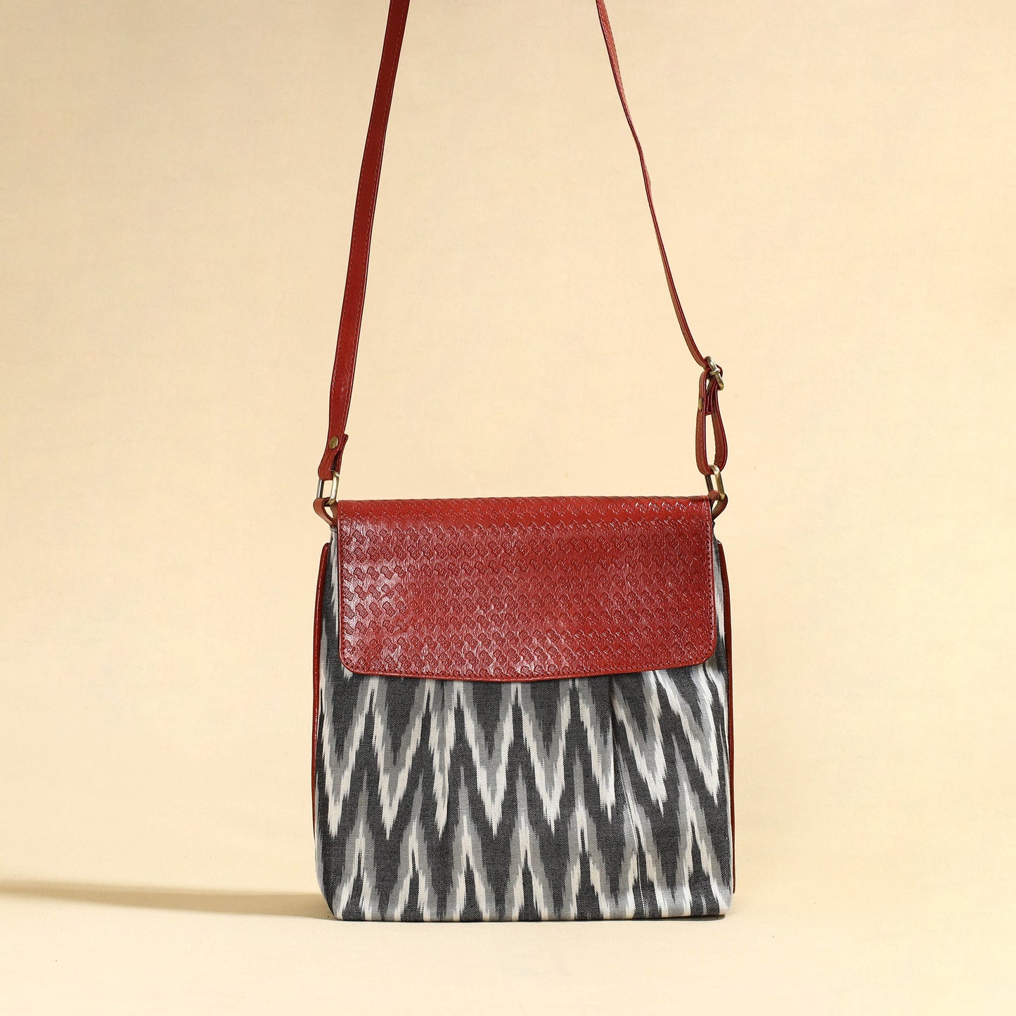 Grey Handcrafted Ikat Fabric Sling Bag with Embossed Leather Flap