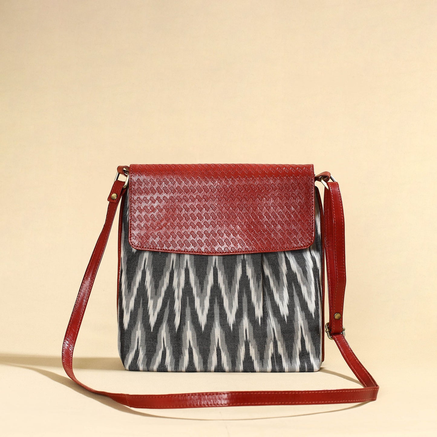 Grey Handcrafted Ikat Fabric Sling Bag with Embossed Leather Flap