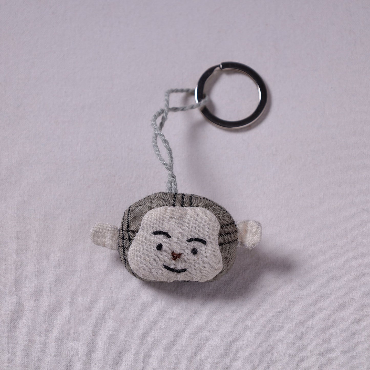 Grey Handcrafted Fab Artwork Keychain