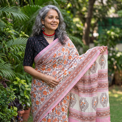 Pink hand block print merino wool Sanganeri saree, draped and worn by a woman, AI visual of the saree, iTokri