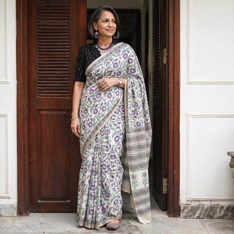 White hand block print merino wool Sanganeri saree, draped and worn by a woman, AI visual of the saree, iTokri